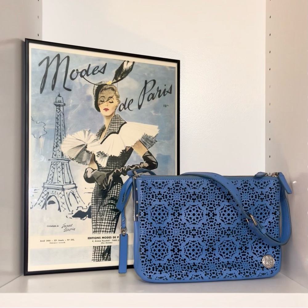 Vince Camuto periwinkle geometric starburst motif leather purse